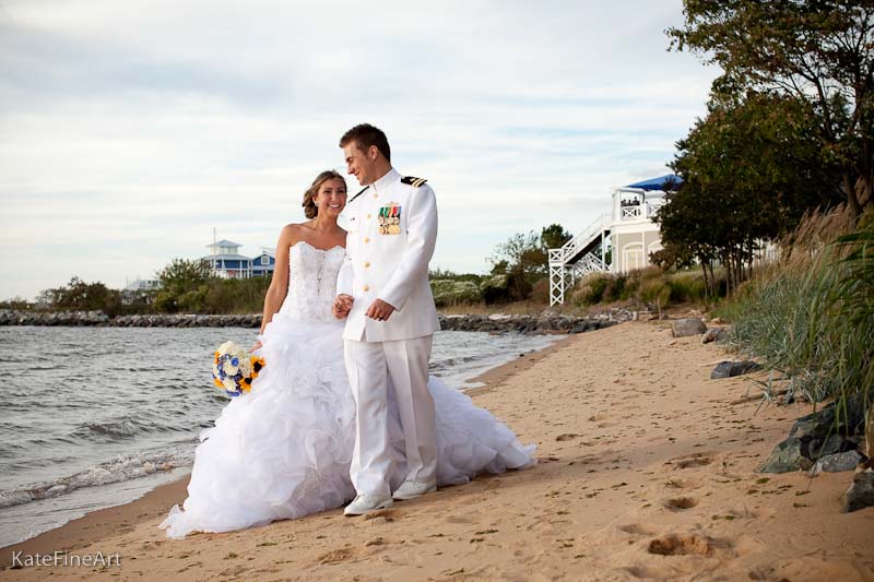 Bride and groom walking along the beach at the Chesapeake Bay Beach Club.