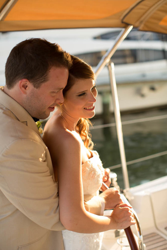 bride and groom portrait on a boat, a popular choice for Port Annapolis Marina Weddings