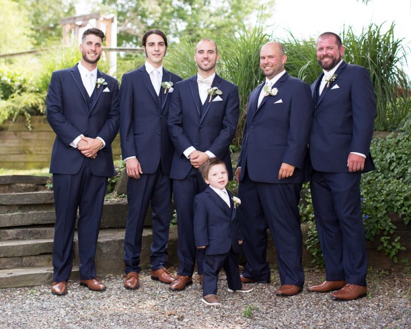 Groomsmen by the water at Port annapolis marina