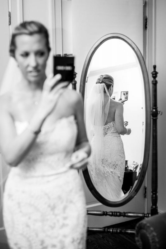 bride getting ready in the bridal suite at the kent manor inn