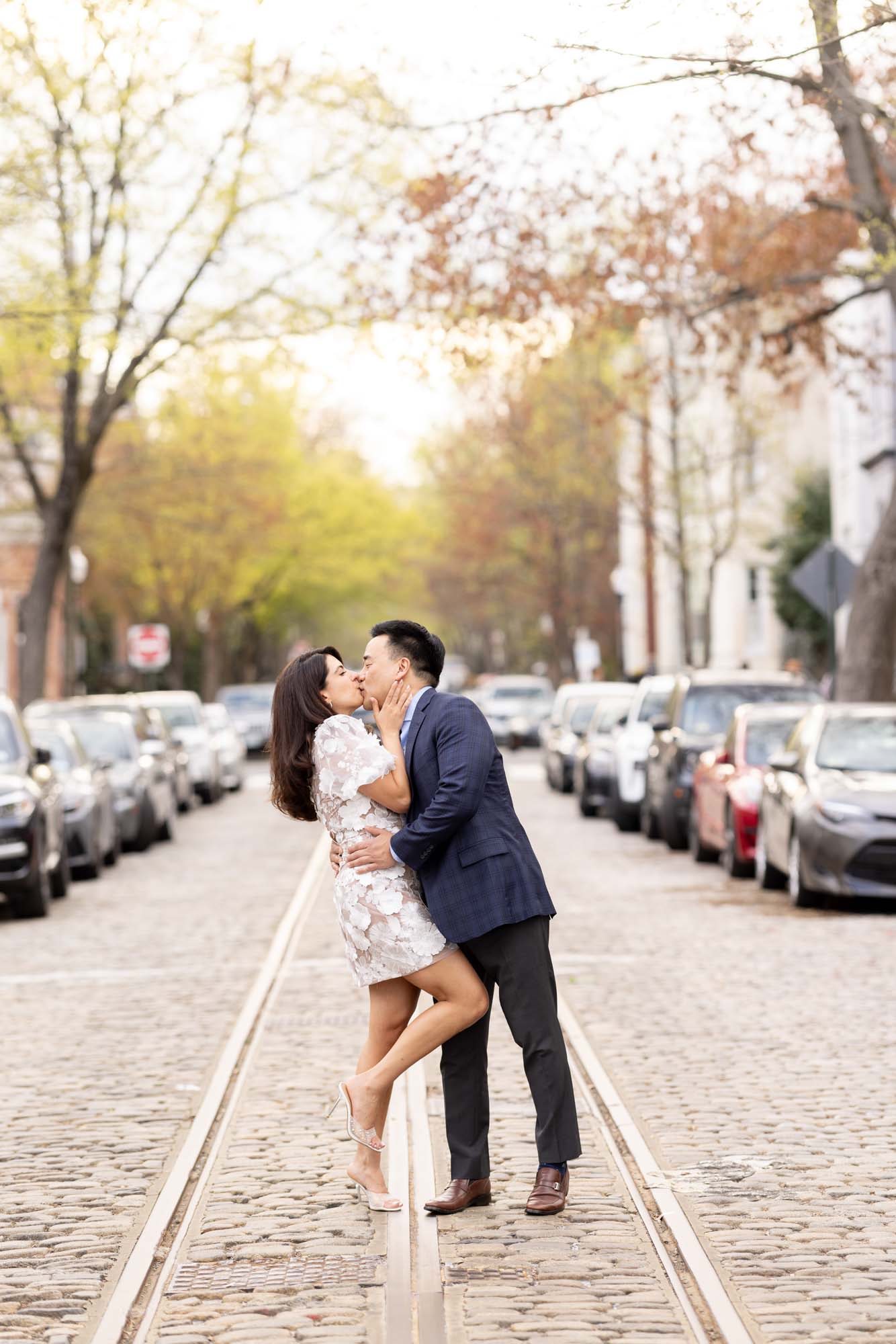 Couple kissing in Georgetown DC for an engagement photo